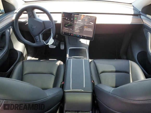 2022 Tesla Model Y Performance z VIN 7SAYGDEF2NF573979, wystawiony jako Copart lot #57778265 z przebiegiem 49 232 mil mil oraz Szkoda całkowita • Salvage title. Historia ofert i sprzedaży dostępna na DreamBid. Obrazek 8.