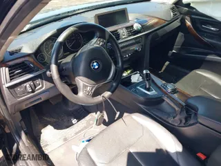 2014 BMW 3 Series 328i xDrive with VIN WBA3B5G59ENS09377, listed as a IAAI auction lot 41921377 with 102,160 mi miles. Bid and sale history available at carsss.com. Image 5.