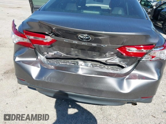2019 Toyota Camry LE with VIN 4T1B11HK4KU286959, listed as a IAAI auction lot 42063344 with 92,481 mi miles and . Bid and sale history available at DreamBid. Image 6.