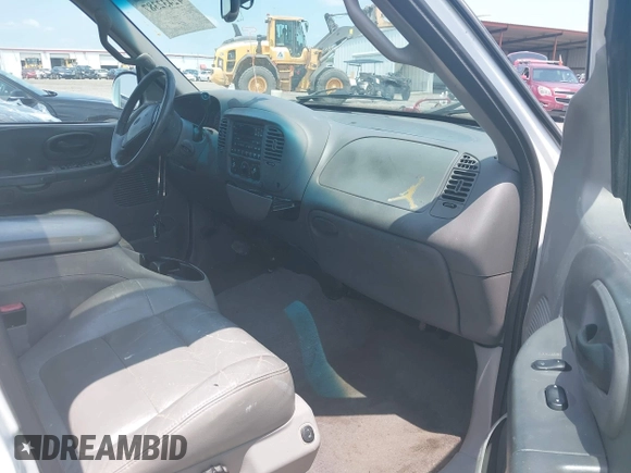 2001 Ford F-150 XLT with VIN 1FTRW07L91KB77612, listed as a IAAI auction lot 42432387 with 106,574 mi miles and . Bid and sale history available at DreamBid. Image 5.