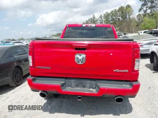 2020 Ram 1500 Big Horn z VIN 1C6SRFFT3LN301735, wystawiony jako IAAI lot #41954914 z przebiegiem 95 279 mil mil oraz . Historia ofert i sprzedaży dostępna na DreamBid. Obrazek 16.