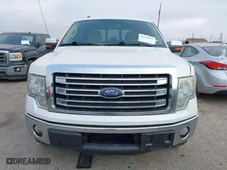 2013 Ford F-150 XL with VIN 1FTFW1CT8DKF09574, listed as a IAAI auction lot 41250642 with 233,935 mi miles. Bid and sale history available at carsss.com. Image 12.