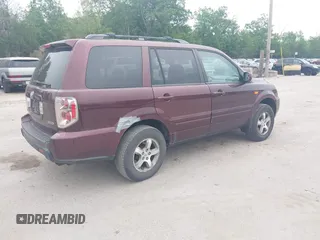 2007 Honda Pilot EX-L with VIN 2HKYF18597H513543, listed as a IAAI auction lot 42509483 with 201,778 mi miles and . Bid and sale history available at DreamBid. Image 4.