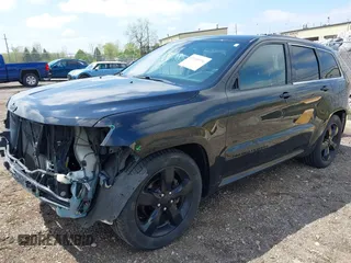 2016 Jeep Grand Cherokee High Altitude z VIN 1C4RJFCGXGC334335, wystawiony jako IAAI lot #42188996 z przebiegiem 212 689 mil mil oraz . Historia ofert i sprzedaży dostępna na DreamBid. Obrazek 18.