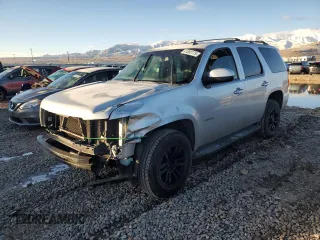 2012 Chevrolet Tahoe LS with VIN 1GNSCAE05CR202824, listed as a Copart auction lot 41580175 with 200,955 mi miles and Salvage title. Bid and sale history available at DreamBid. Image 1.