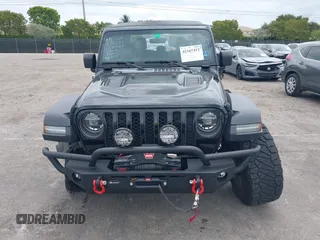 2021 Jeep Gladiator Rubicon с VIN 1C6JJTBG6ML622904, выставлен на аукционе IAAI как лот 42167412 с пробегом 21 889 миль миль и . История ставок и продаж доступна на DreamBid. Изображение 12.