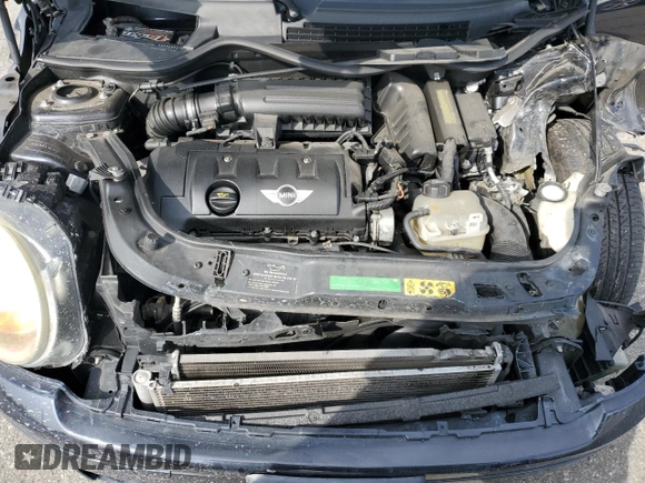 2007 MINI Hardtop z VIN WMWMF33537TT54433, wystawiony jako Copart lot #58813415 z przebiegiem 111 250 mil mil oraz Szkoda całkowita • Salvage title. Historia ofert i sprzedaży dostępna na DreamBid. Obrazek 11.