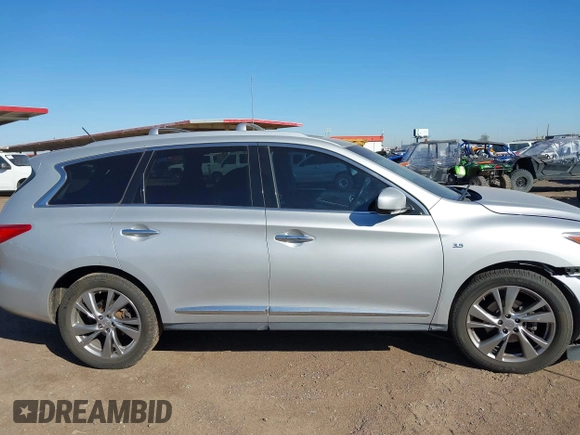 2015 Infiniti QX60 with VIN 5N1AL0MN7FC553099, listed as a IAAI auction lot 42094321 with 100,023 mi miles and . Bid and sale history available at DreamBid. Image 13.