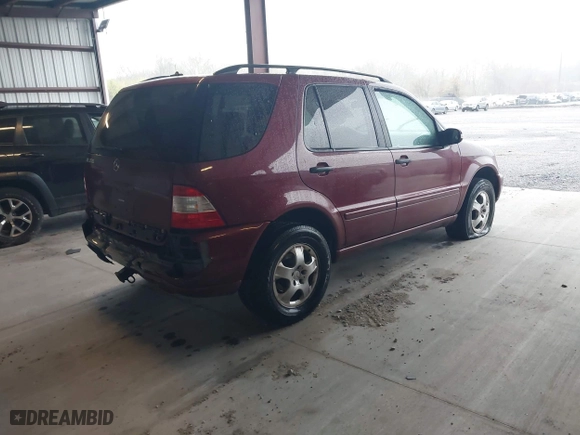 2003 Mercedes-Benz M-Class 3.7L with VIN 4JGAB57E13A448528, listed as a IAAI auction lot 41953003 with 256,637 mi miles. Bid and sale history available at carsss.com. Image 4.