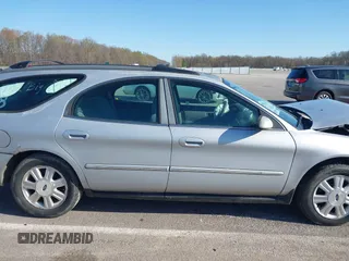 2003 Ford Taurus z VIN 1FAHP59U83A234246, wystawiony jako IAAI lot #41975597 z przebiegiem 178 869 mil mil oraz . Historia ofert i sprzedaży dostępna na DreamBid. Obrazek 13.