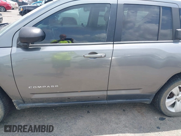 2011 Jeep Compass Latitude with VIN 1J4NT1FB4BD246549, listed as a IAAI auction lot 42156761 with 232,739 mi miles. Bid and sale history available at carsss.com. Image 12.