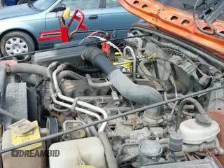 2002 Jeep Wrangler X with VIN 1J4FA39S22P731157, listed as a IAAI auction lot 43240376 with 154,782 mi miles and . Bid and sale history available at DreamBid. Image 13.