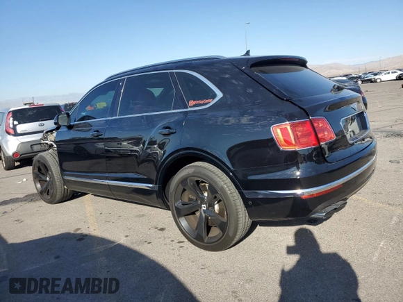 2019 Bentley Bentayga V8 z VIN SJAAM2ZV5KC024154, wystawiony jako Copart lot #74990344 z przebiegiem 41 589 mil mil oraz Szkoda całkowita • Salvage title. Historia ofert i sprzedaży dostępna na DreamBid. Obrazek 2.