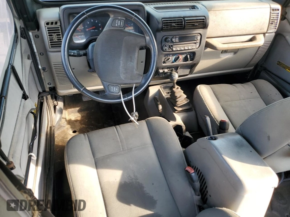 2003 Jeep Wrangler Sahara with VIN 1J4FA59S83P318057, listed as a Copart auction lot 58781495 with 102,571 mi miles and Clean title. Bid and sale history available at DreamBid. Image 8.