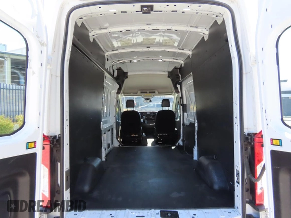2020 Ford Transit Cargo с VIN 1FTBR1X8XLKB60749, выставлен на аукционе Copart как лот 61684405 с пробегом 77 415 миль миль и Списание • Salvage title. История ставок и продаж доступна на DreamBid. Изображение 6.