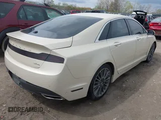 2014 Lincoln MKZ z VIN 3LN6L2JK7ER821385, wystawiony jako IAAI lot #42114154 z przebiegiem 141 480 mil mil oraz . Historia ofert i sprzedaży dostępna na DreamBid. Obrazek 4.