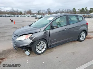2014 Ford C-Max Hybrid SE with VIN 1FADP5AU6EL513969, listed as a IAAI auction lot 41899566 with 122,239 mi miles. Bid and sale history available at carsss.com. Image 2.