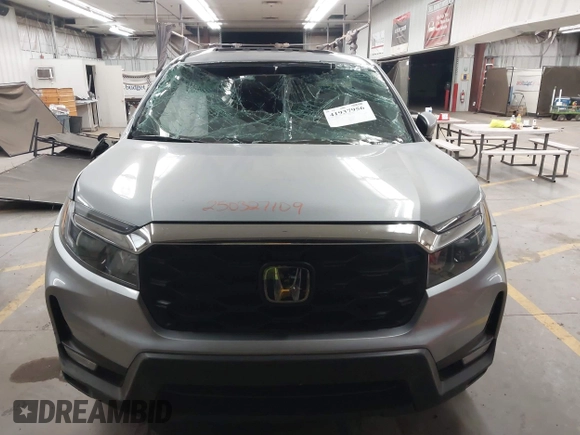 2023 Honda Passport EX-L with VIN 5FNYF8H56PB025612, listed as a IAAI auction lot 41937956 with 31,065 mi miles and . Bid and sale history available at DreamBid. Image 12.