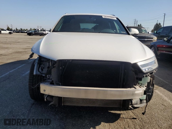 2018 Audi Q3 Premium Plus with VIN WA1HCCFS5JR013581, listed as a Copart auction lot 56422095 with 103,565 mi miles and Salvage title. Bid and sale history available at DreamBid. Image 5.