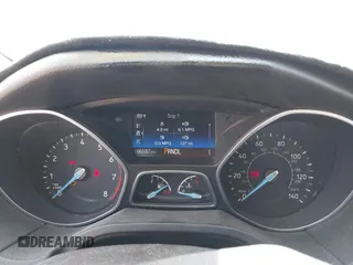 2016 Ford Focus SE z VIN 1FADP3F24GL268619, wystawiony jako IAAI lot #42750298 z przebiegiem 96 587 mil mil oraz . Historia ofert i sprzedaży dostępna na DreamBid. Obrazek 7.
