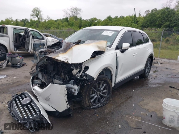2022 Mazda CX-9 Sport with VIN JM3TCBBYXN0603510, listed as a IAAI auction lot 42027879 with Not provided miles and . Bid and sale history available at DreamBid. Image 2.