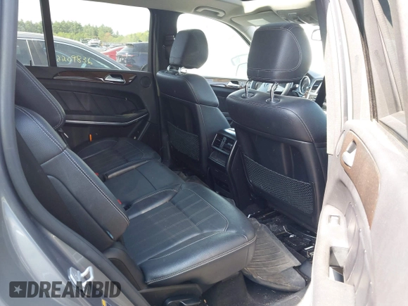 2014 Mercedes-Benz GL 450 with VIN 4JGDF7CE0EA290673, listed as a IAAI auction lot 42207889 with 132,251 mi miles and . Bid and sale history available at DreamBid. Image 8.