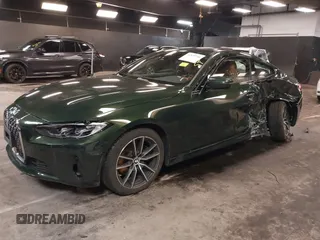 2022 BMW 4 Series 430i xDrive with VIN WBA73AP04NCK88044, listed as a IAAI auction lot 41577730 with 28,907 mi miles and . Bid and sale history available at DreamBid. Image 2.