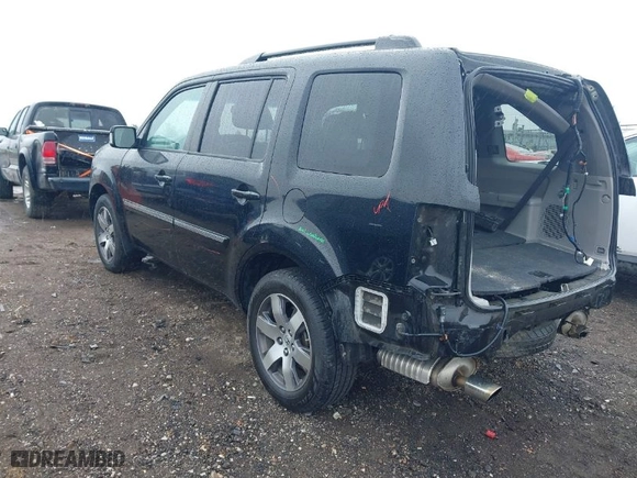 2012 Honda Pilot Touring with VIN 5FNYF4H94CB011228, listed as a IAAI auction lot 41808492 with 231,047 mi miles. Bid and sale history available at carsss.com. Image 3.