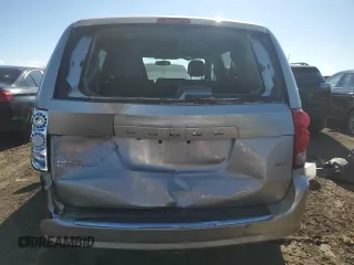 2016 Dodge Grand Caravan SXT with VIN 2C4RDGCG5GR219517, listed as a Copart auction lot 50052405 with 104,552 mi miles and Salvage Title. Bid and sale history available at DreamBid. Image 6.