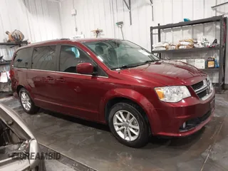 2019 Dodge Grand Caravan SXT with VIN 2C4RDGCG9KR678235, listed as a IAAI auction lot 41864931 with 127,848 mi miles and . Bid and sale history available at DreamBid. Image 1.