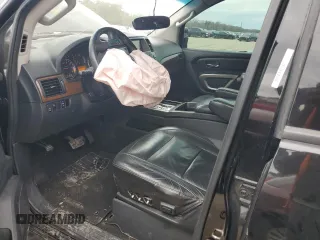 2015 Nissan Armada Platinum z VIN 5N1BA0NF5FN610793, wystawiony jako Copart lot #88765185 z przebiegiem 174 327 mil mil oraz Szkoda całkowita • Salvage title. Historia ofert i sprzedaży dostępna na DreamBid. Obrazek 7.
