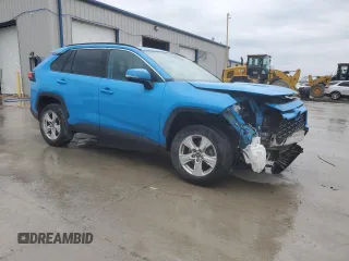 2021 Toyota RAV4 XLE with VIN 2T3P1RFV2MC142047, listed as a Copart auction lot 59095105 with 90,624 mi miles and Salvage title. Bid and sale history available at DreamBid. Image 4.