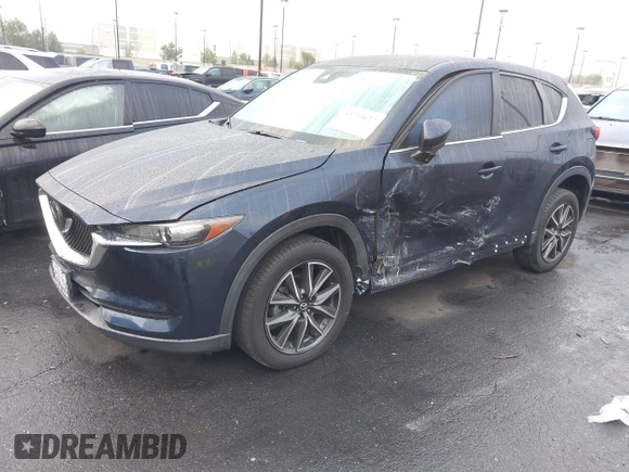 2018 Mazda CX-5 Touring with VIN JM3KFACM9J0464621, listed as a IAAI auction lot 41723627 with 45,916 mi miles. Bid and sale history available at carsss.com. Image 19.