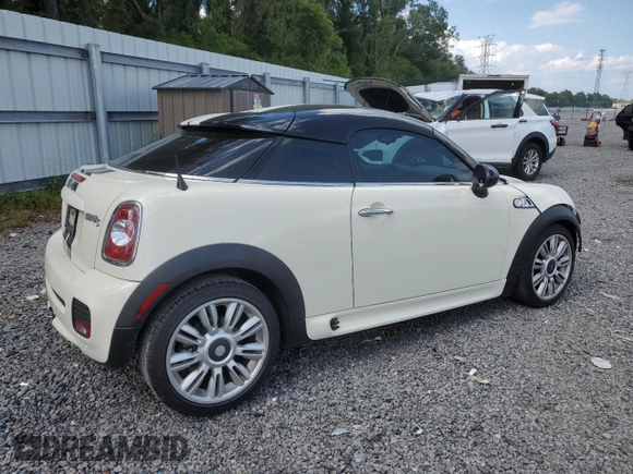 2012 MINI Coupe S z VIN WMWSX3C56CT154872, wystawiony jako Copart lot #68011264 z przebiegiem 91 650 mil mil oraz Szkody całkowita. Historia ofert i sprzedaży dostępna na DreamBid. Obrazek 3.