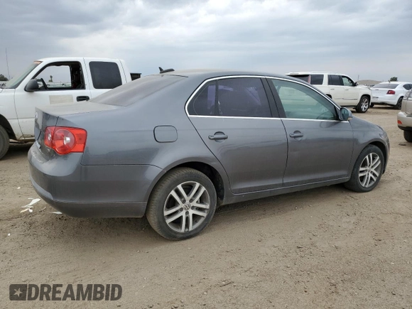 2006 Volkswagen Jetta z VIN 3VWDG71K66M748387, wystawiony jako Copart lot #55269553 z przebiegiem 141 937 mil mil oraz Czysty tytuł • Clean title. Historia ofert i sprzedaży dostępna na DreamBid. Obrazek 3.