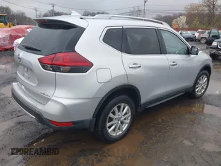2018 Nissan Rogue SV with VIN 5N1AT2MVXJC800314, listed as a IAAI auction lot 42021347 with 27,129 mi miles and . Bid and sale history available at DreamBid. Image 4.