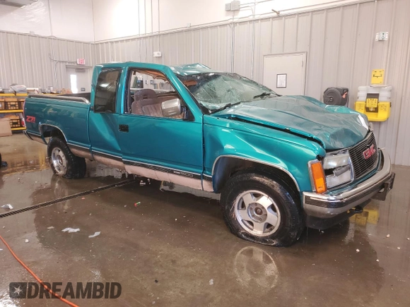 1993 GMC Sierra 1500 z VIN 2GTEK19K8P1562964, wystawiony jako Copart lot #86767744 z przebiegiem 237 615 mil mil oraz Czysty tytuł • Clean title. Historia ofert i sprzedaży dostępna na DreamBid. Obrazek 4.