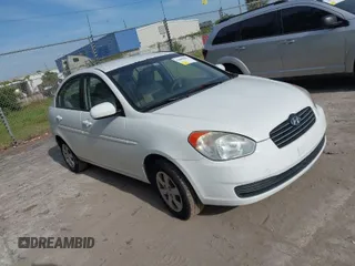 2011 Hyundai Accent GLS with VIN KMHCN4AC0BU613032, listed as a IAAI auction lot 42089042 with 132,518 mi miles. Bid and sale history available at carsss.com. Image 1.