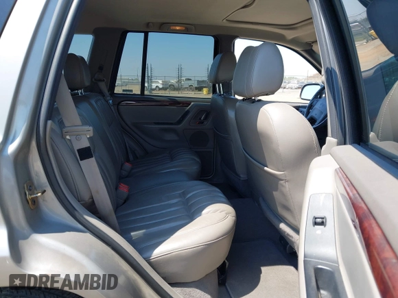 2000 Jeep Grand Cherokee Limited with VIN 1J4GW58N5YC361724, listed as a IAAI auction lot 42722980 with 136,590 mi miles and . Bid and sale history available at DreamBid. Image 8.