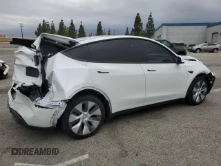 2024 Tesla Model Y Long Range with VIN 7SAYGDEE8RF088808, listed as a Copart auction lot 50406865 with 8,150 mi miles and Salvage title. Bid and sale history available at DreamBid. Image 3.