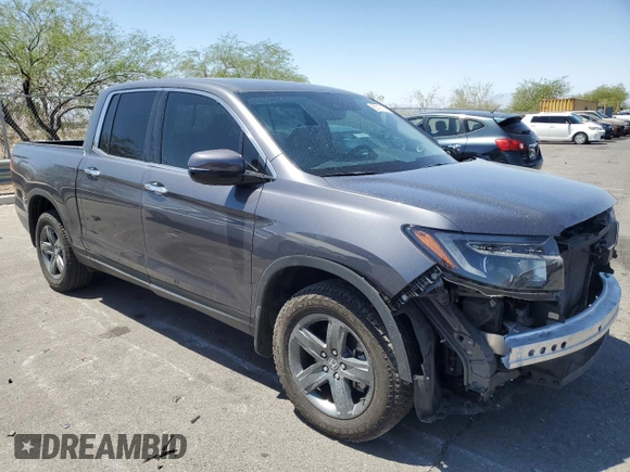 2022 Honda Ridgeline RTL-E with VIN 5FPYK3F73NB039135, listed as a Copart auction lot 60512115 with 27,348 mi miles and Salvage title. Bid and sale history available at DreamBid. Image 4.