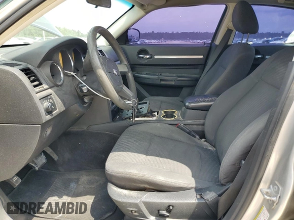 2010 Dodge Charger SXT with VIN 2B3CA3CV5AH185969, listed as a Copart auction lot 55684185 with 138,384 mi miles and Salvage Title. Bid and sale history available at DreamBid. Image 7.
