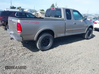 2001 Ford F-150 XL z VIN 1FTRX18WX1NA13022, wystawiony jako IAAI lot #41954491 z przebiegiem 126 284 mil mil oraz . Historia ofert i sprzedaży dostępna na DreamBid. Obrazek 4.