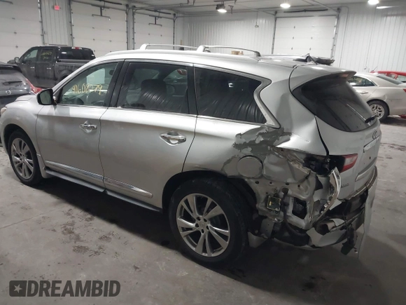 2013 Infiniti JX35 with VIN 5N1AL0MMXDC344217, listed as a IAAI auction lot 41608279 with 106,015 mi miles and . Bid and sale history available at DreamBid. Image 3.