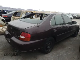 1998 Nissan Altima XE with VIN 1N4DL01D8WC266874, listed as a Copart auction lot 48636595 with 0 mi miles and Salvage Title. Bid and sale history available at carsss.com. Image 3.