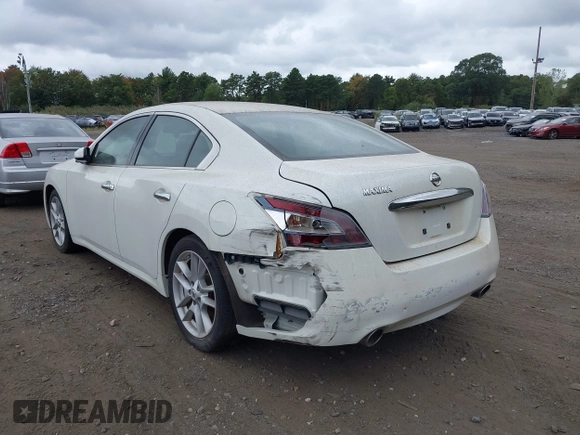 2014 Nissan Maxima S with VIN 1N4AA5AP1EC478918, listed as a IAAI auction lot 40426108 with 101,635 mi miles and . Bid and sale history available at DreamBid. Image 3.