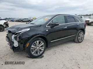 2022 Cadillac XT5 FWD Premium Luxury z VIN 1GYKNCRS4NZ154675, wystawiony jako Copart lot #53485335 z przebiegiem 23 869 mil mil oraz Szkoda całkowita • Salvage title. Historia ofert i sprzedaży dostępna na DreamBid. Obrazek 1.