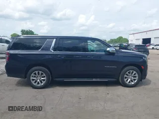2023 Chevrolet Suburban Premier with VIN 1GNSCFKDXPR380853, listed as a IAAI auction lot 41935510 with 70,682 mi miles and . Bid and sale history available at DreamBid. Image 13.