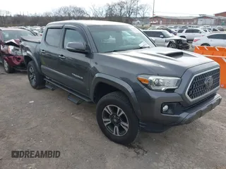 2018 Toyota Tacoma SR with VIN 3TMCZ5AN0JM150540, listed as a IAAI auction lot 41683174 with 78,553 mi miles and . Bid and sale history available at DreamBid. Image 1.