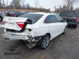 2016 Toyota Camry XSE with VIN 4T1BK1FK2GU570484, listed as a IAAI auction lot 41395359 with 122,852 mi miles. Bid and sale history available at carsss.com. Image 4.